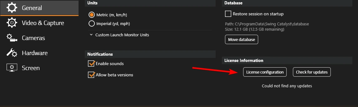 Settings, General page, with a red arrow pointing to the License configuration button under License Information